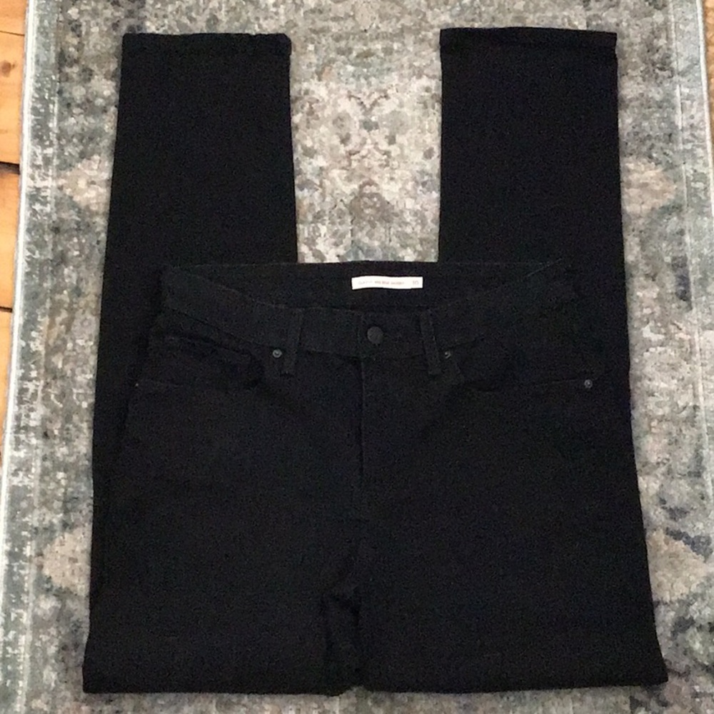 Levi ladies Black Jeans size 10; mid rise skinny
